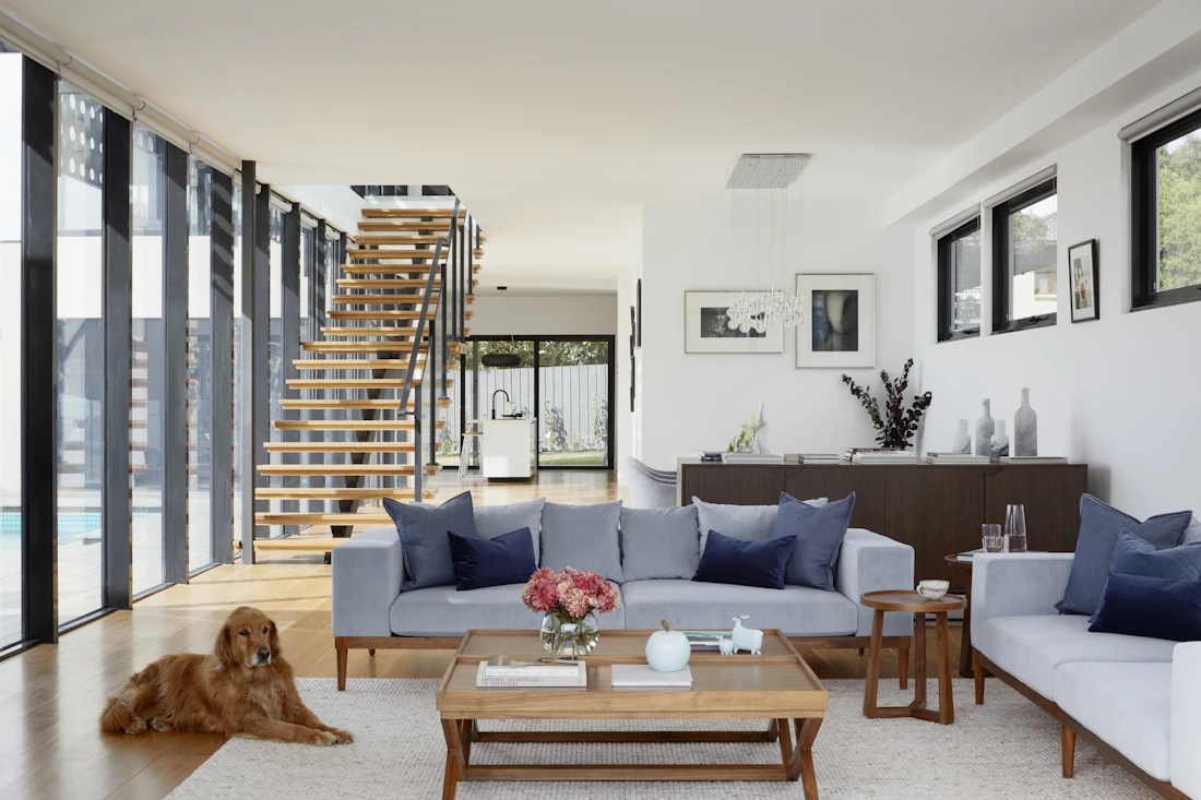 Modern apartment living space with warm natural finishes